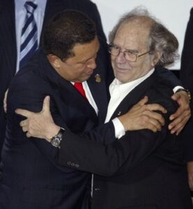 Venezuelan President Chavez embraces Argentine Nobel Peace laureate Adolfo Perez Esquivel in Buenos Aires
